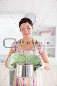 Charming Woman holding a pot