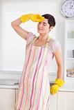 Worn out woman in cleaning gown