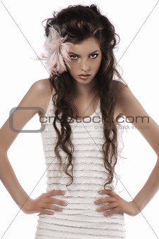 girl with pink feather in her hair 