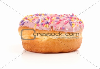 Pink Iced Donut covered in sprinkles