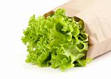 fresh salad lettuce in a paper package