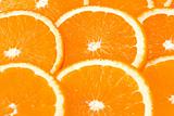 orange background made from slices of citrus fruits