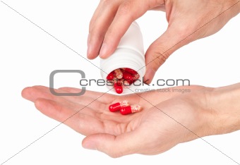 pills in a human hand