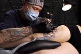 Tattooing a thigh