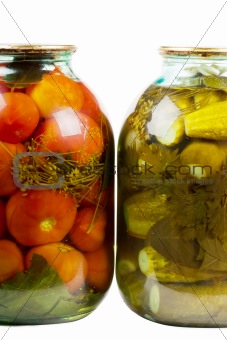 Jars of pickles and tomatoes