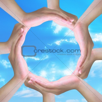 human hands making a circle with copy space in light