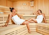 Females relaxing in sauna
