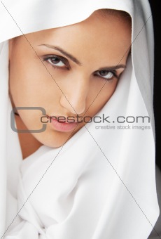 Female face white veil