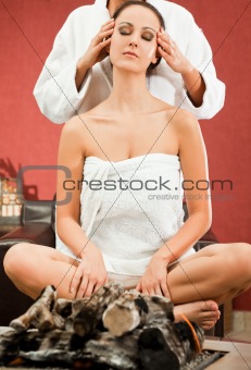 Woman massage fireplace