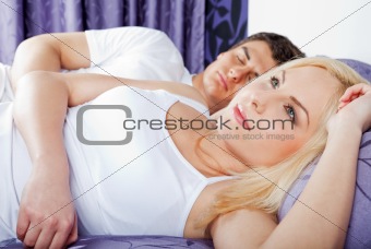 Couple bed awake thinking