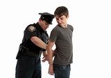 Policeman handcuffing teenager