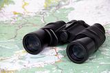 Binoculars and map
