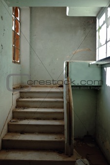 dirty staircase and peeling walls