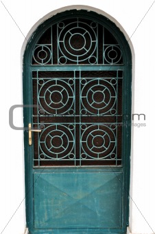 metal door with concentric circles motif