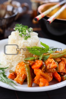 Red chicken curry stripes with rice