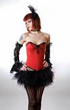Attractive woman in red corset and black skirt 
