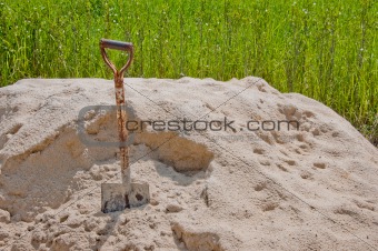 shovel in sand