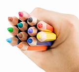 Multicolor pencils in hand