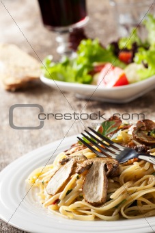 pasta with cap mushrooms on a plate
