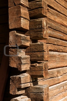 Old wooden log house corner