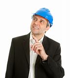 Portrait of successfull architect wearing blue hard hat and pointing