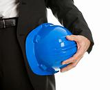 Close-up of architect/worker holding blue hard hat