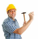 Confident worker wearing hard hat and hammering in