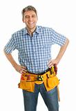 Confident worker wearing toolbelt