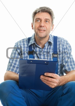 Confident service man taking notes