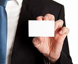 Close-up of businessman holding blank card