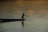 A fisherman on the Mekong