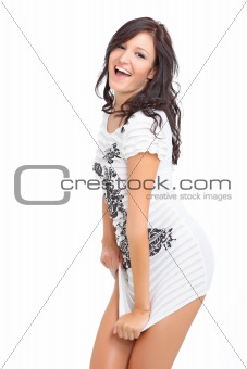 Young brunette laughing and posing