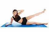 Fitness woman doing aerobics on gym mat