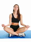 Fitness woman sitting in lotus yoga position