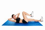 Fitness woman doing crunches on gym mat