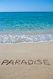 Paradise written on the sand