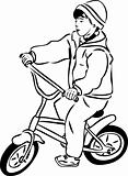 sketch of a boy riding a bicycle on a small