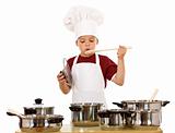 Boy in chef hat playing