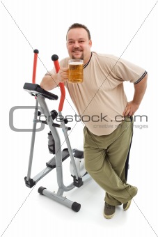 Overweight man having a beer after working out
