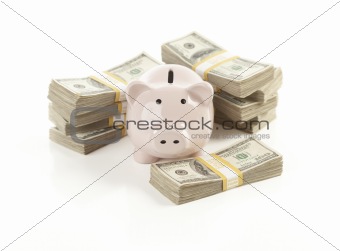 Pink Piggy Bank with Stacks of Hundreds of Dollars Isolated on a White Background.