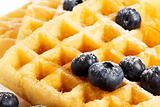 waffles with blueberries and syrup