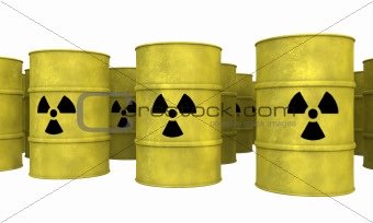 rows of yellow nuclear waste barrel