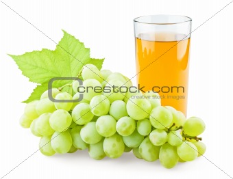 Juicy grape with leaf and full glass of juice