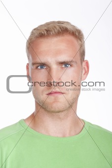portrait of a young man with blond hair and blue eyes - isolated on white