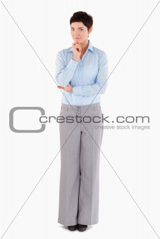 Thoughtful businesswoman standing up