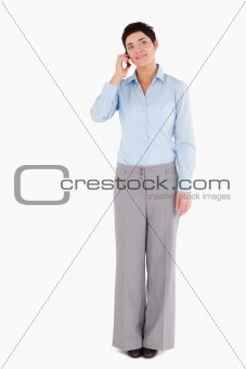 Serious woman making a phone call