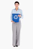 Businesswoman with a recycling bin