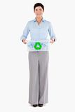 Businesswoman holding a recycling box