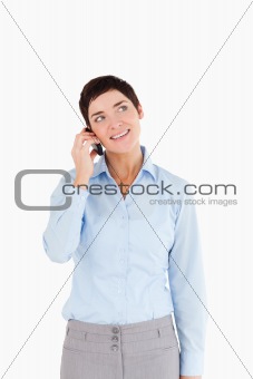 Portrait of a businesswoman answering the phone