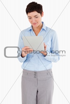 Portrait of a businesswoman looking at a document